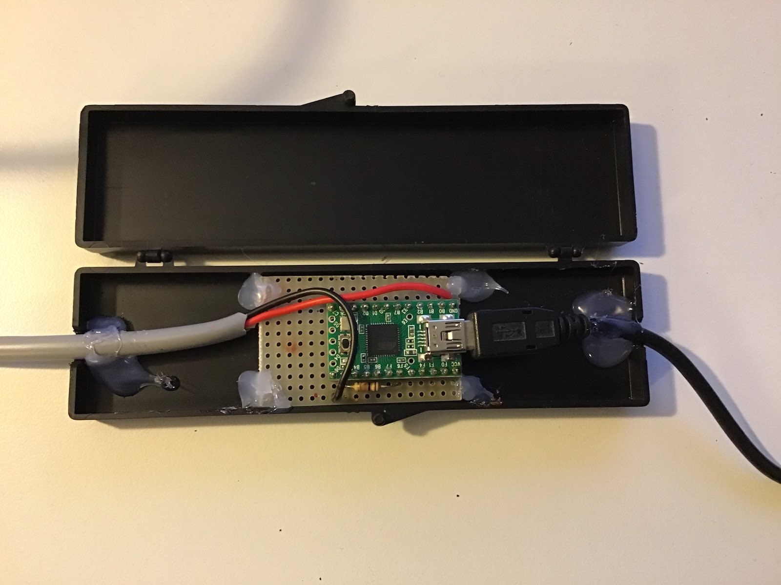 The board glued into its case