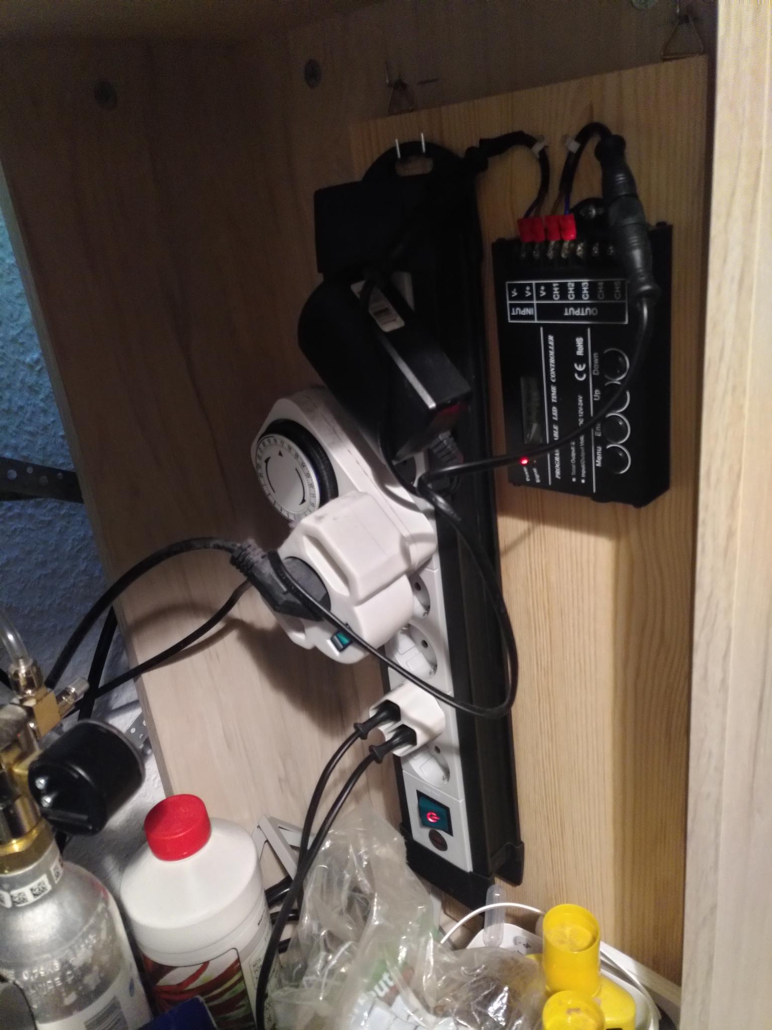 The board hinged into the fishtank's floor cupboard in full operation.